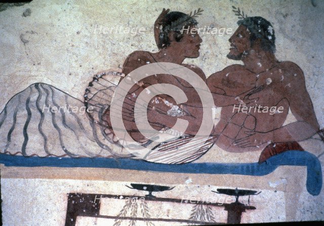 Fresco in the tomb of Tuffatore representing two men at a banquet.