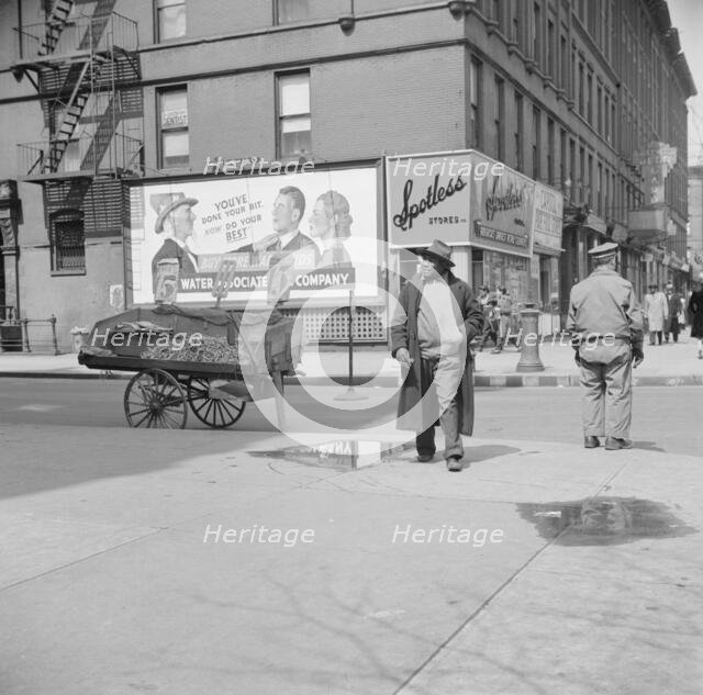 A Harlem street scene, New York, 1943. Creator: Gordon Parks.