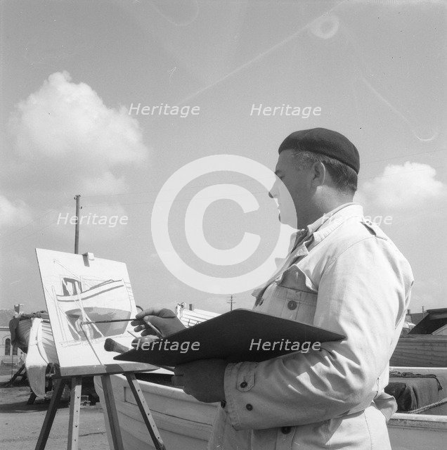 An artist painting in the harbour of Borstahusen, Landskrona, Sweden, 1952. Artist: Unknown