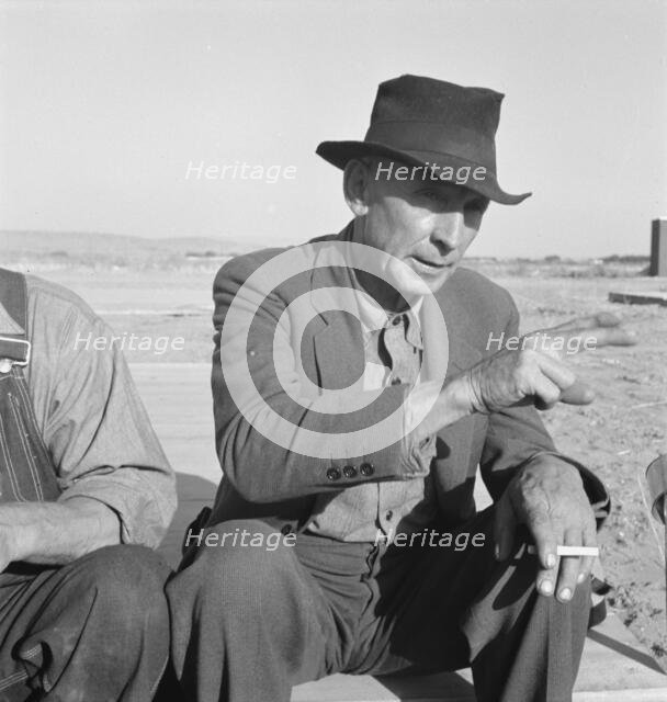 Former Nebraska Farmer, now a migrant farm worker, Klamath County, Oregon, 1939. Creator: Dorothea Lange.