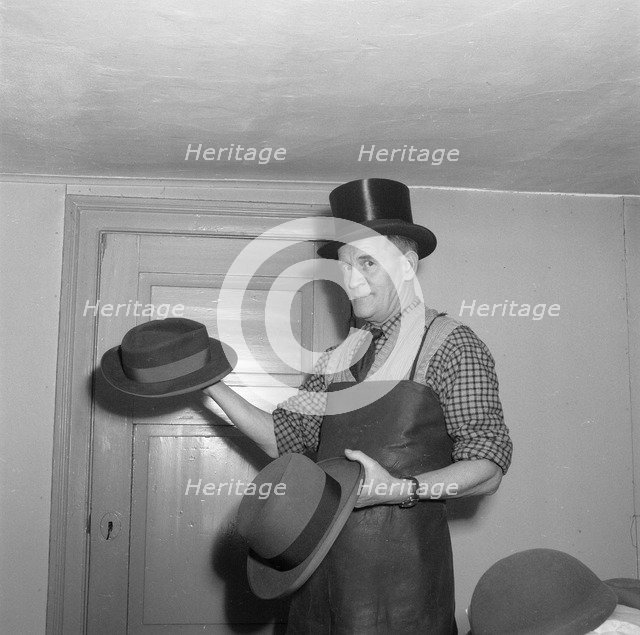A hatter, Landskrona, Sweden, 1952. Artist: Unknown