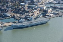 HMS Prince of Wales aircraft carrier in dock with HMS Victory, Portsmouth, Hants, 2020. Creator: Damian Grady.