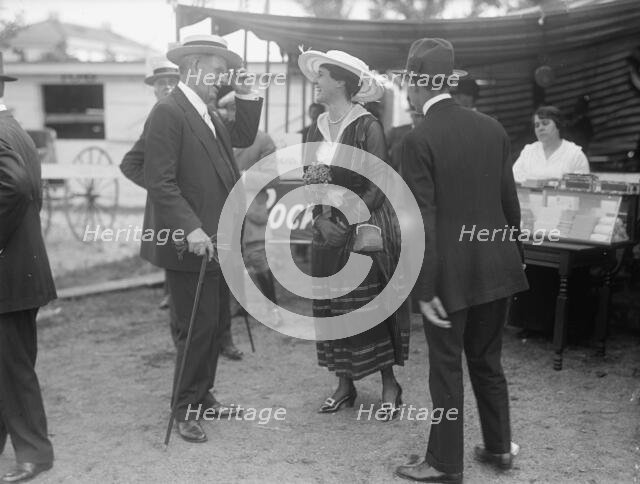 Horse Shows - Judge Moore And Mrs. Hitt, 1916. Creator: Harris & Ewing.