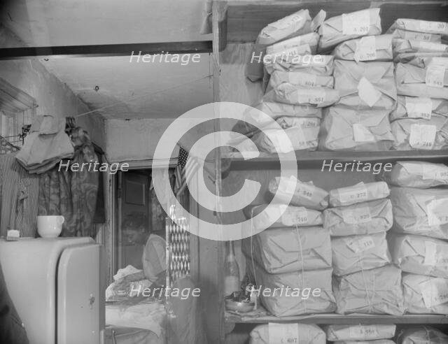 Possibly: Johnnie Lew's Chinese laundry on Monday morning, Washington, D.C., 1942. Creator: Gordon Parks.