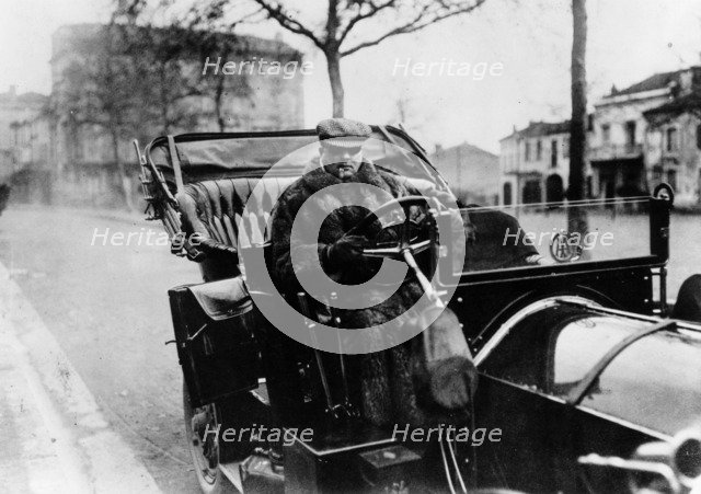 Lord Northcliffe at the wheel of a 1908 135 hp Mercedes, (c1908?). Artist: Unknown