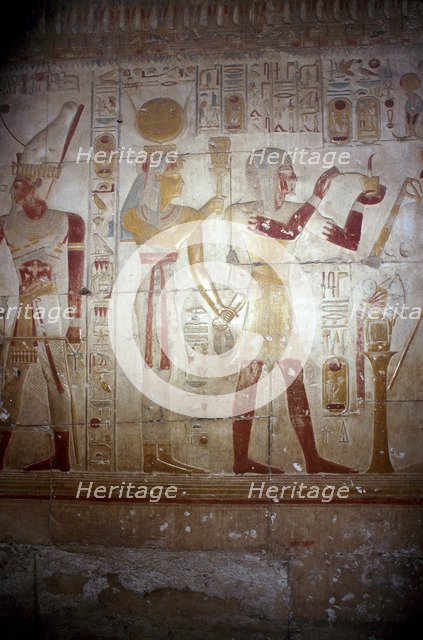 Painted relief of Sethos and Isis-Hathor, Temple of Sethos I, Abydos, Egypt, 19th Dynasty, c1280 BC. Artist: Unknown