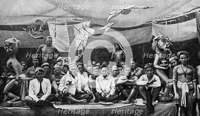 Traditional enemies assembled at a peace conference in Claudetown, Sarawak, c1899, (1922).Artist: Dr Charles Hose