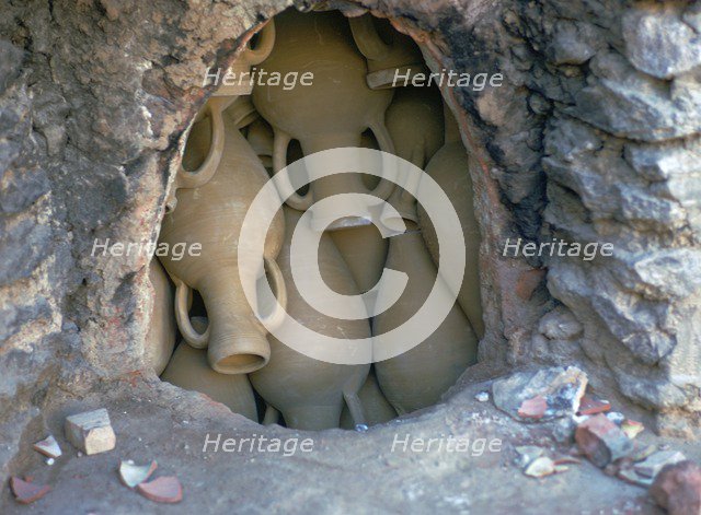 Pottery in a kiln before firing in Tunisia. Artist: Unknown