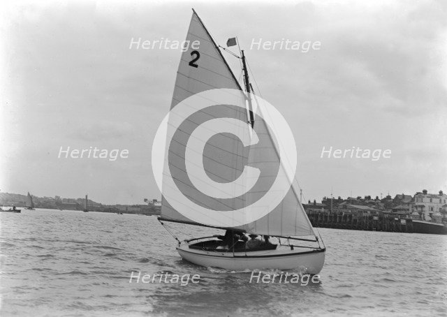 The Hamble River Class 'Dot' (No 2) sailing close-hauled, 1921. Creator: Kirk & Sons of Cowes.
