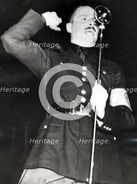 Sir Oswald Mosley addressing a Blackshirt meeting in the East End of London, 1936. Artist: Unknown