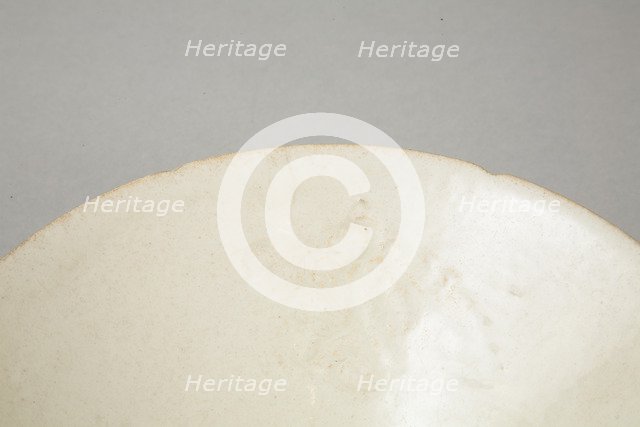 Lobed bowl with qingbai glaze with carved floral design made in the Northern Song dynasty. Artist: Unknown.