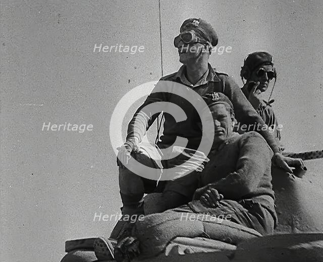 Allied Soldiers Riding a Tank, 1942. Creator: British Pathe Ltd.