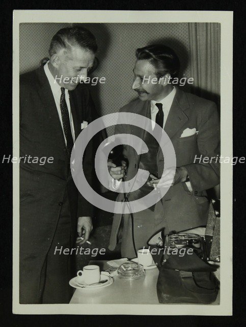 American bandleader Stan Kenton giving an interview, c1950s. Artist: Denis Williams