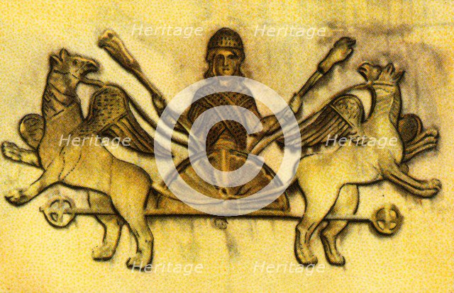 Alexander the Great in a chariot pulled by winged griffins, (1932).  Creator: Unknown.