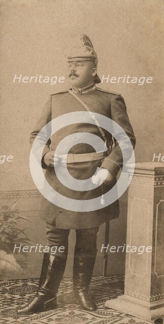 Fire Chief A. F. Domishkevich in Uniform with a Sabre and in a Helmet, 1901. Creator: Unknown.