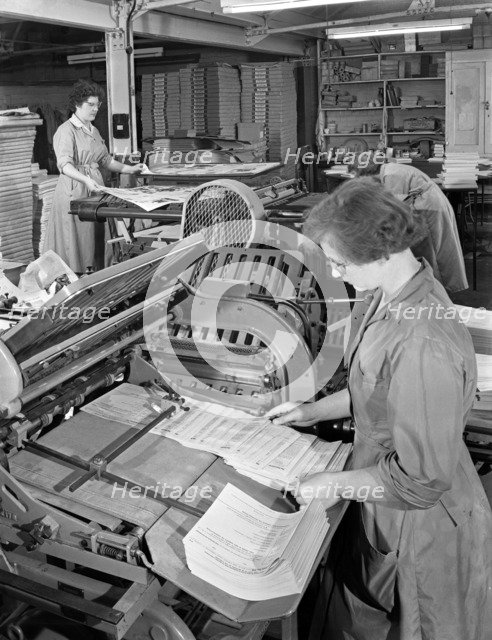 A folding machine in a printworks, Mexborough, South Yorkshire, 1959. Artist: Michael Walters