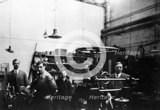 Men in a printing workshop, (late 19th-early 20th century?). Artist: W Martin