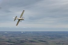 Reims-Cessna F172M Skyhawk in flight near Driffield, East Riding of Yorkshire, 2023. Creator: Chloe Pearson Jones.