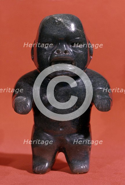 Jade figurine, probably a child although the Olmecs used to represent adults with childlike featu…