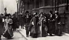 Emmeline Pankhurst, British suffragette leader, carrying a petition, London, 13 February 1908. Artist: Unknown