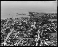 The town, looking towards the pier and Peveril Point, Swanage, 1937. Creator: Aeropictorial Ltd.