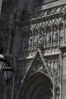 Elaborate figure entrance to the Votivkirche, Vienna, Austria, 2022. Creator: Ethel Davies.