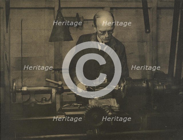 Untitled (Industry; man working lathe), 1920s. Creator: AJ Wales.