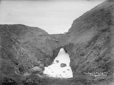 The Devil's Frying Pan, Cadgwith Cove, Cornwall, 1896-1920. Artist: Alfred Newton & Sons.