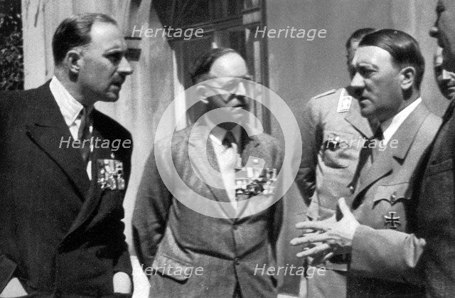 British soldiers talking with Adolf Hitler, 1936. Artist: Unknown