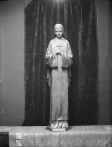 Statue of St. Theresa by Mario Korbel, between 1914 and 1928. Creators: Arnold Genthe, Mario Korbel.