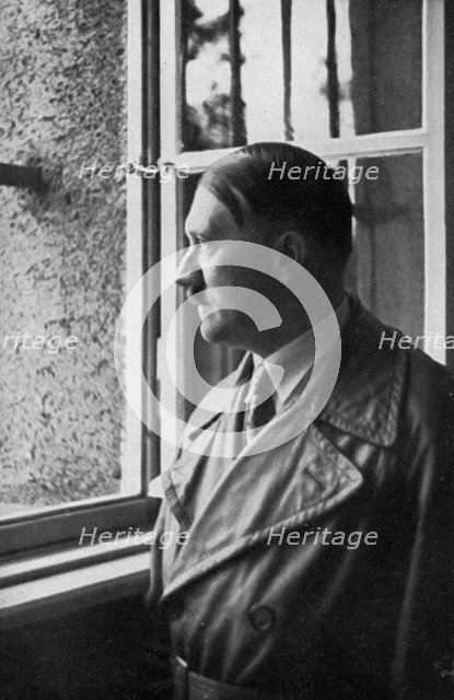 Adolf Hitler looks out of his cell window at Landsberg Fortress, Bavaria, Germany, 1934. Artist: Unknown