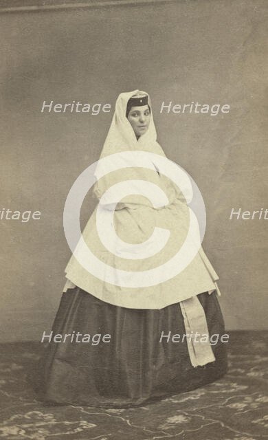 Full-length portrait of Georgian woman, facing right, between 1870 and 1886. Creator: Unknown.