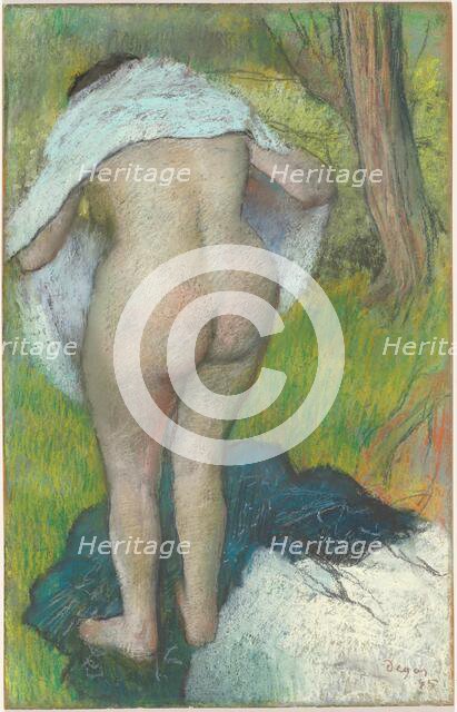 Young Woman Dressing Herself, 1885. Creator: Edgar Degas.