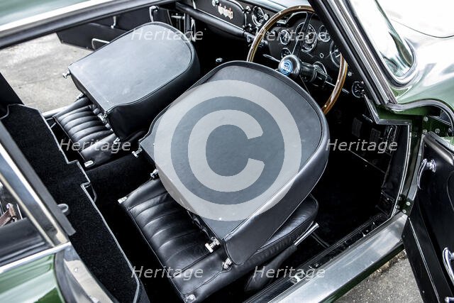 Folded down front seats of a 1961 Aston Martin DB4 GT previously owned by Donald Campbell. Creator: Unknown.