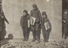 John Pento, 14 years old, Daniel and Angelo Pento, 7 years old, selling newspapers..., 3348. Creator: Lewis Wickes Hine.