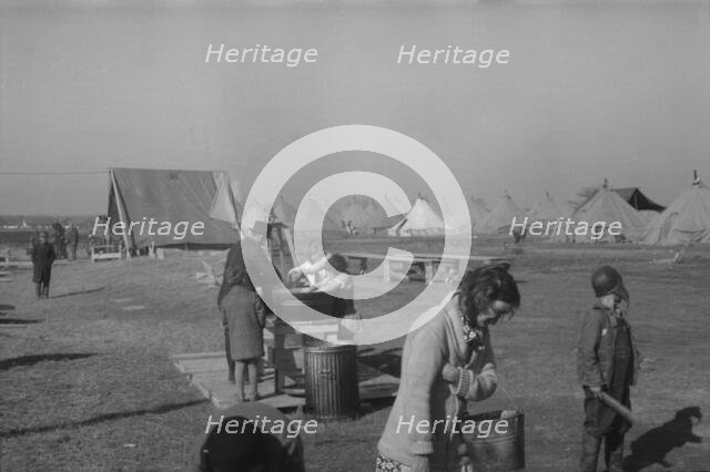 Facilities for washing in the camp for white flood...at Forrest City, Arkansas, 1937. Creator: Walker Evans.