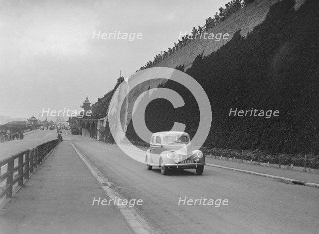 Ford V8 of CGH Barraclough on Madeira Drive, Brighton, RAC Rally, 1939. Artist: Bill Brunell.