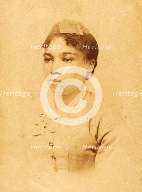 Portrait of unidentified young woman wearing ribbon on head, c1880-c1889. Creator: JW Perkins.