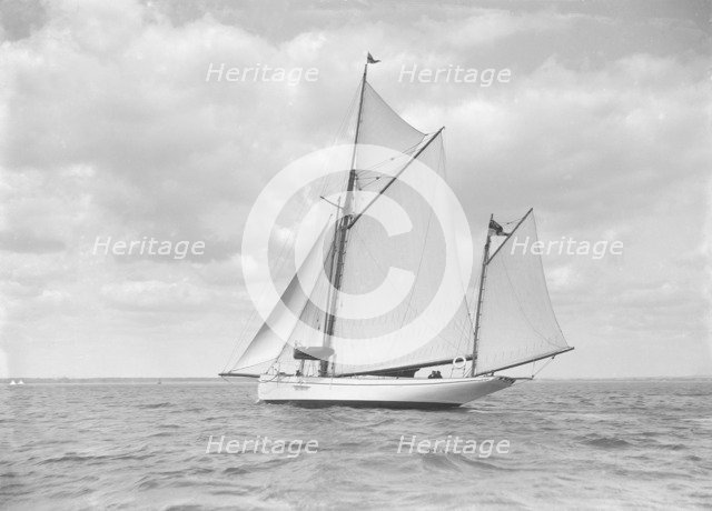 The yawl 'Pleiad' under sail, 1911. Creator: Kirk & Sons of Cowes.