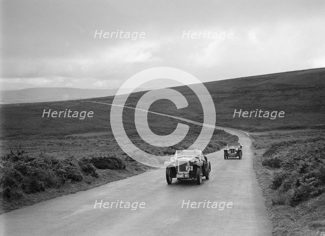 Austin 7 AEW of AL Chard ahead of FG Cornish's MG TA at the MCC Torquay Rally, July 1937. Artist: Bill Brunell.
