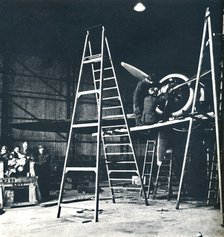 'The ground crew's work is never done', 1941. Artist: Cecil Beaton.