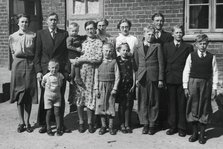 Swedish dairy farmer Axel Nilson with his wife and children, 20 May 1941. Artist: Otto Ohm
