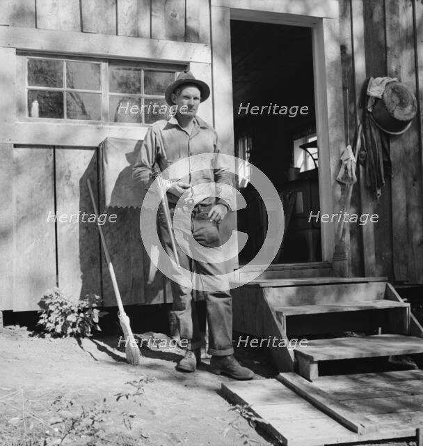 Roy Carlock, member of Ola self-help sawmill co-op, Gem County, Idaho, 1939. Creator: Dorothea Lange.