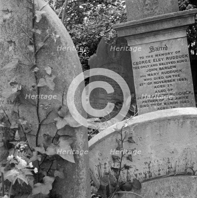 Gravestones, Highgate Cemetery, Hampstead, London, 1987. Artist: John Gay.