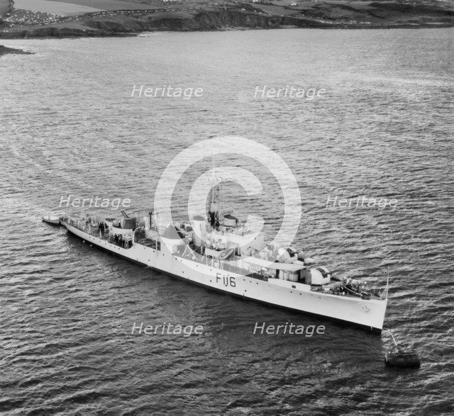 HMS 'Amethyst' (F116) moored off the Plymouth Breakwater, Plymouth, Devon, 1950. Artist: Aerofilms.