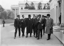 Daniels, Josephus, Secretary of The Navy, 1913-1921. with Newsmen, 1914. Creator: Harris & Ewing.
