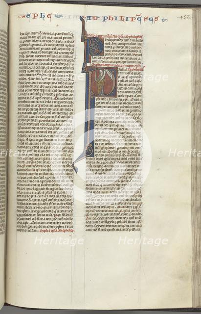 Fol. 452r, Philippians, historiated initial P, Paul standing with a sword and a scroll, talking to t Creator: Unknown.