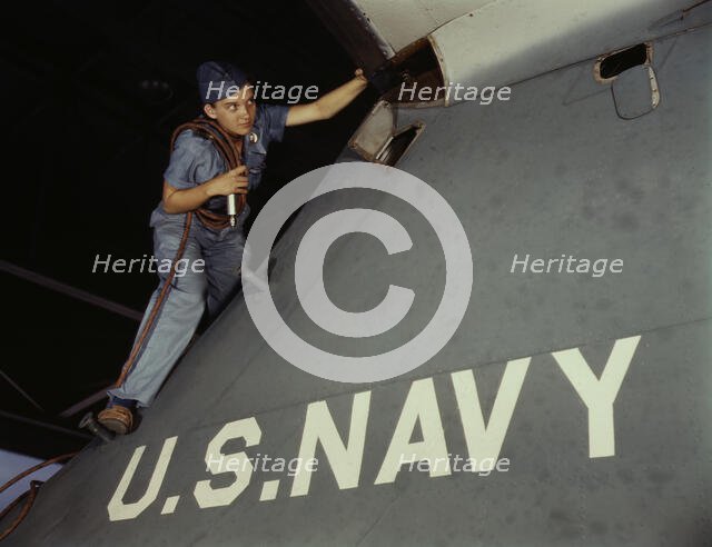 Lorena Craig is a cowler under civil service at the Naval Air Base, Corpus Christi, Texas, 1942. Creator: Howard Hollem.