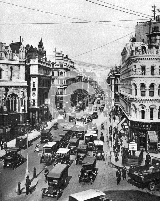 Queen Victoria Street at its intersection with Cannon Street, London, 1926-1927. Artist: Frith