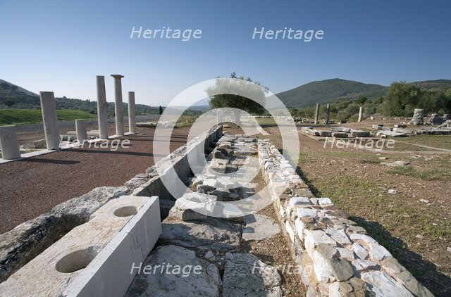 A latrine in Messene, Greece. Artist: Samuel Magal
